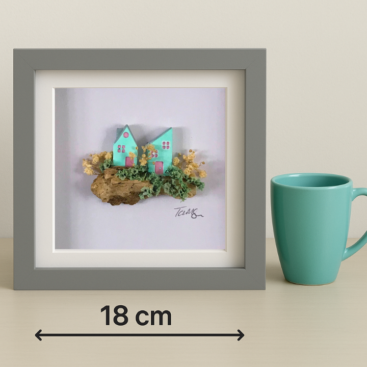 Miniature Turquoise Clay Houses Art – Framed Driftwood Scene with Wild Flowers (18x18cm)